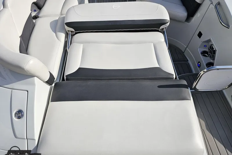 Slide: The Image of 2019 Crownline 275 SS boat interior with sleek, modern seating and stylish design. - 50