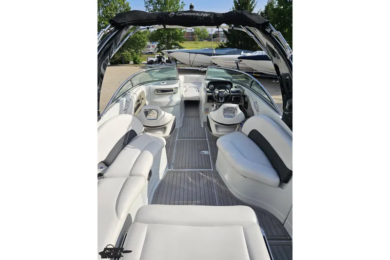 Slide: The Image of 2019 Crownline 275 SS boat interior with luxurious seating and modern dashboard. - 53