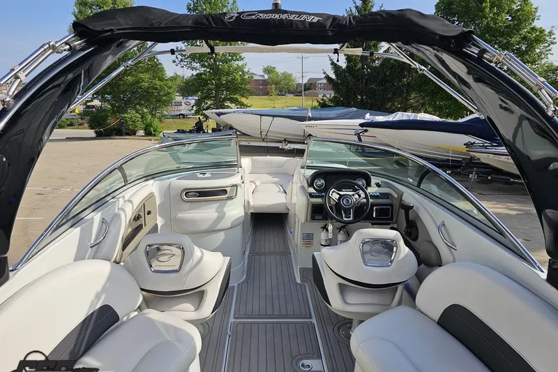Slide: The Image of 2019 Crownline 275 SS boat interior with luxurious seating and modern dashboard. - 55