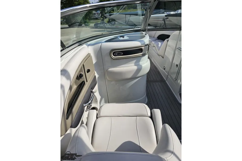 Slide: The Image of 2019 Crownline 275 SS boat interior with sleek seating and modern design. - 66
