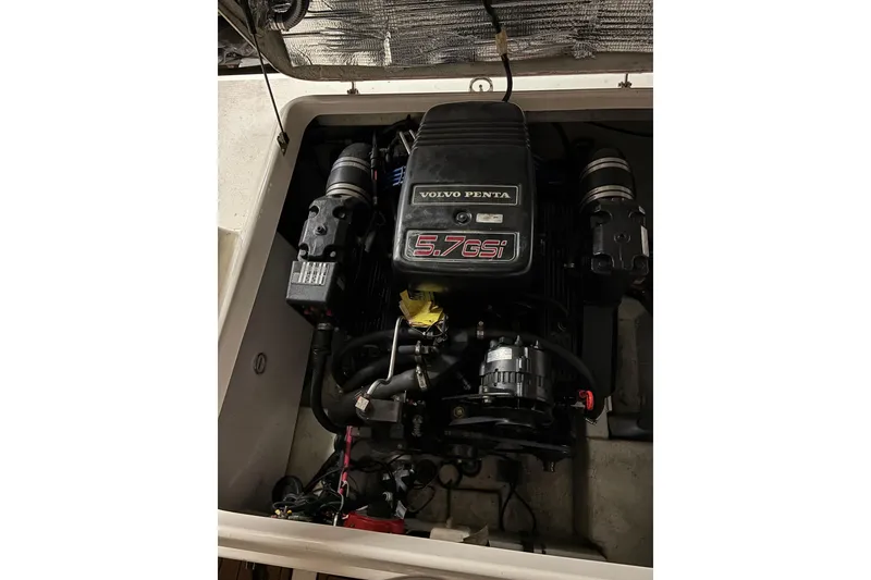 Slide: The Image of Volvo Penta 5.7 GSi engine in 1999 Pursuit 2460 Denali boat. - 14