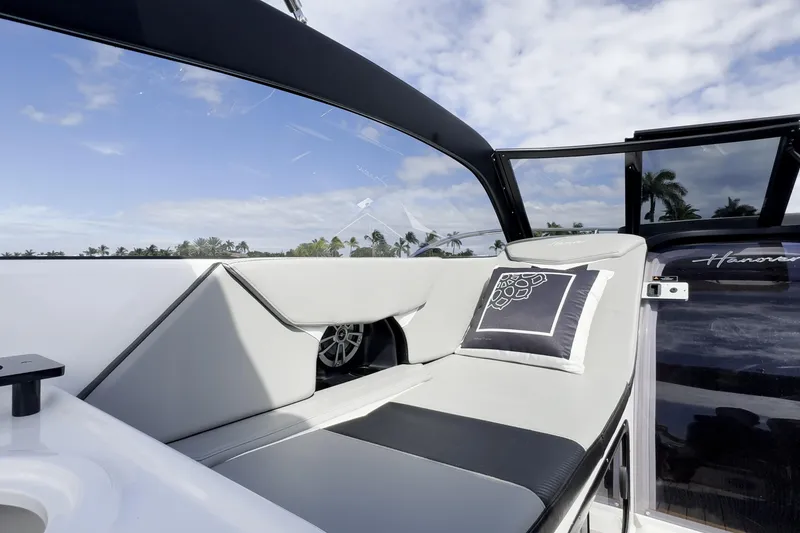 Slide: The Image of Luxurious seating on 2027 Hanover 305 boat with modern design and scenic view. - 17