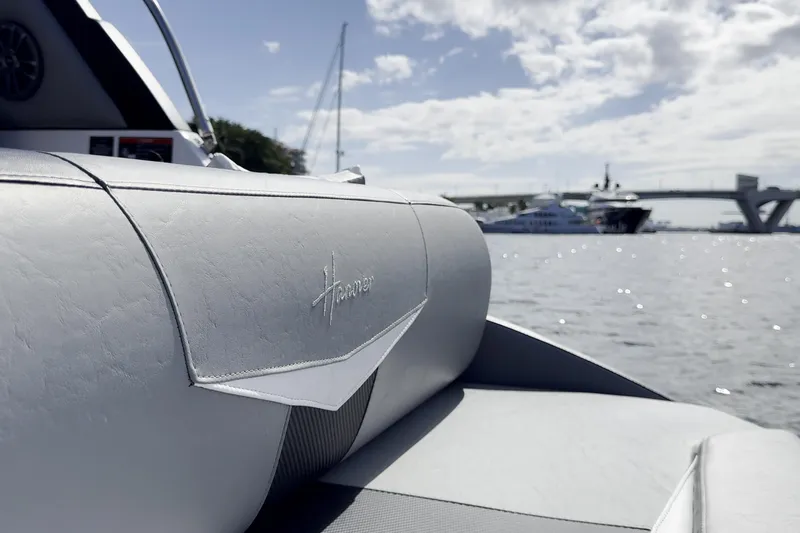 Slide: The Image of Luxurious Hanover 305 boat interior with waterfront view, 2027 model. - 25