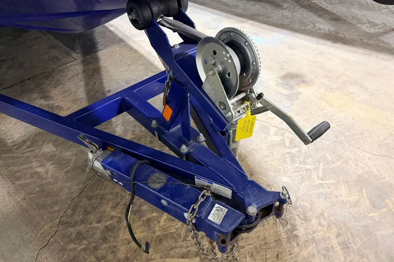 Slide: The Image of Trailer hitch and winch of a 2014 Starcraft 2000 IO Limited boat. - 19