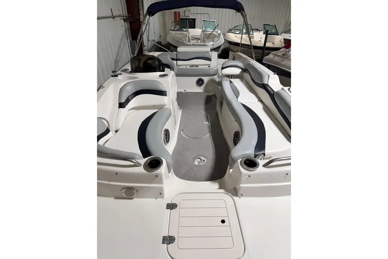 Slide: The Image of 2014 Starcraft 2000 IO Limited boat interior with spacious seating and modern design. - 23