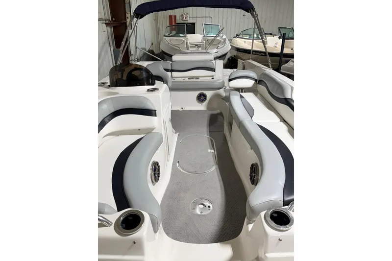 Slide: The Image of 2014 Starcraft 2000 IO Limited boat interior with spacious seating and modern design. - 24