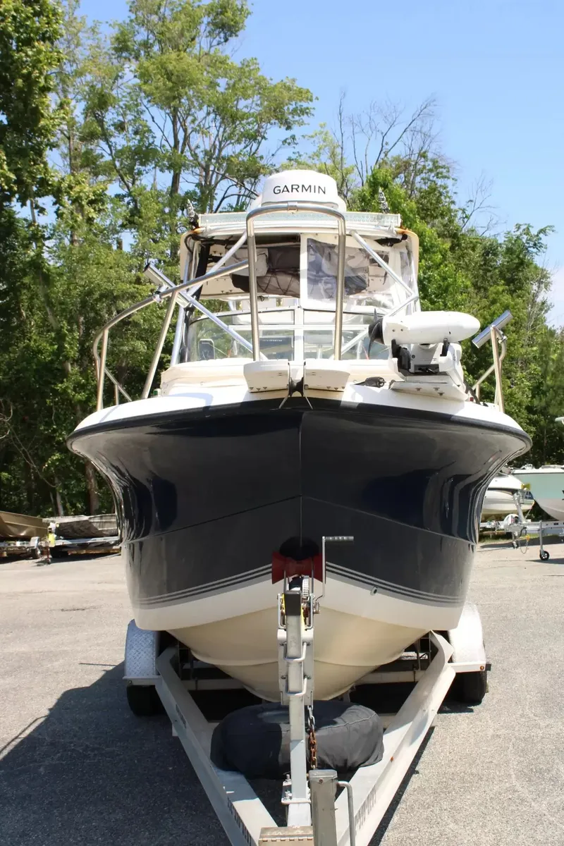 Slide: The Image of 2002 Sea Pro 235WA boat on trailer, front view. - 4