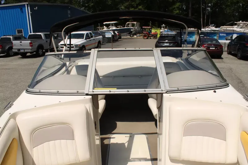 Slide: The Image of 2004 Stingray 180 LX boat with open cabin and windshield. - 17