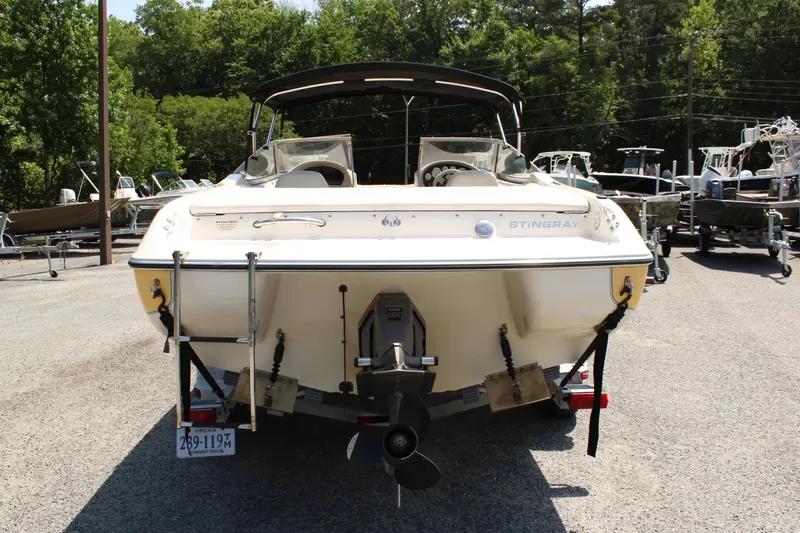 Slide: The Image of Rear view of a 2004 Stingray 180 LX boat on a trailer. - 7