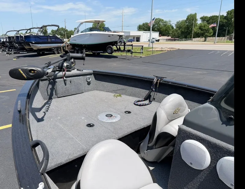 Slide: The Image of Interior view of a 2012 G3 V167 boat on a parking lot. - 12