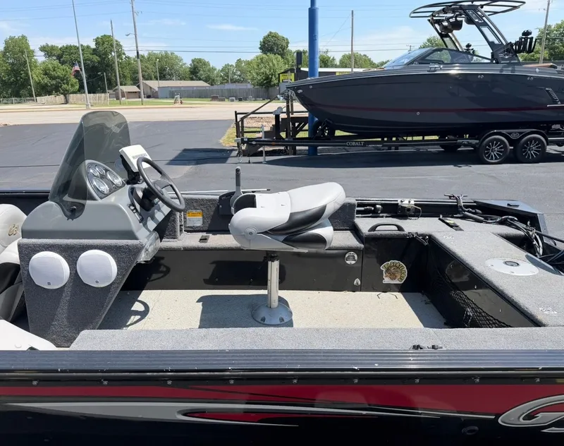 Slide: The Image of Interior of a 2012 G3 V167 boat with steering console and seat. - 13