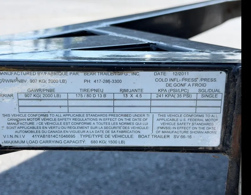 Slide: The Image of Label on a trailer displaying technical specifications and safety standards. - 19