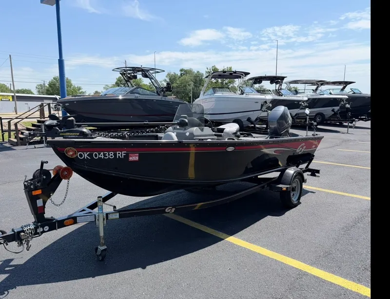 Slide: The Image of Black 2012 G3 V167 boat on trailer outdoors. - 4