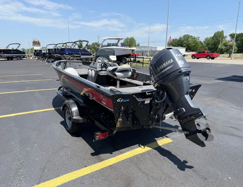 Slide: The Image of 2012 G3 V167 boat with Yamaha engine in parking lot. - 6