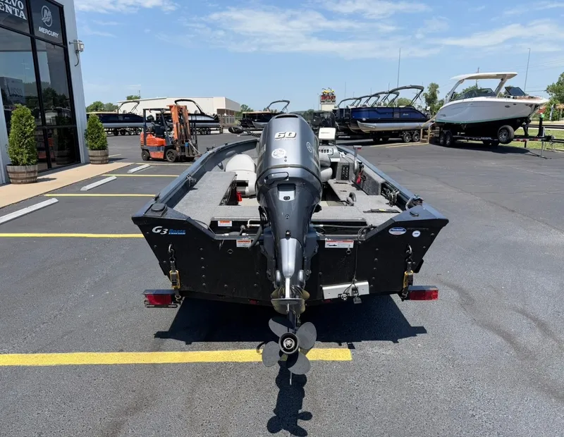 Slide: The Image of 2012 G3 V167 boat with outboard motor in parking lot. - 7