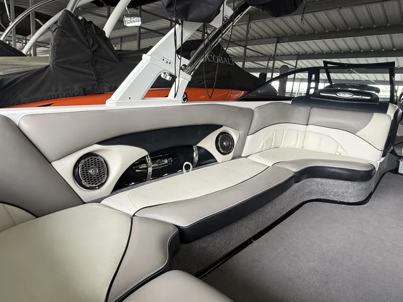 Slide: The Image of Interior of a 2012 Malibu Wakesetter 23 LSV with sleek seating. - 10