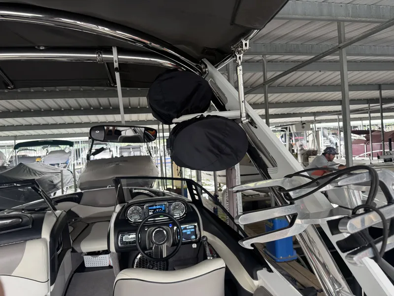 Slide: The Image of Interior of a 2012 Malibu Wakesetter 23 LSV boat in dock. - 12