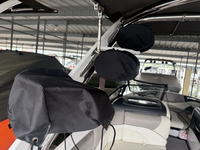 Slide: The Image of 2012 Malibu Wakesetter 23 LSV interior with covers. - 13
