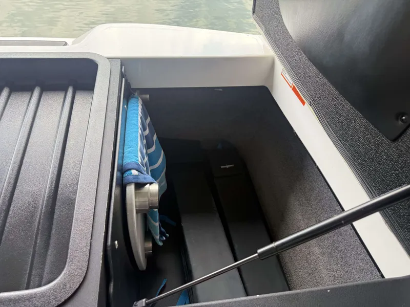 Slide: The Image of Storage compartment in 2012 Malibu Wakesetter 23 LSV boat. - 16