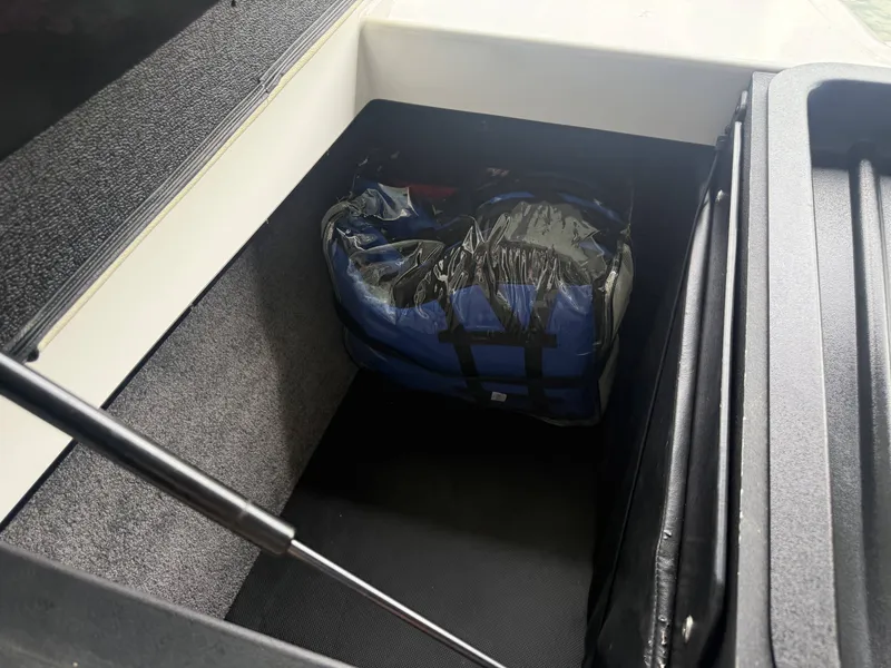 Slide: The Image of Storage compartment in 2012 Malibu Wakesetter 23 LSV boat. - 17