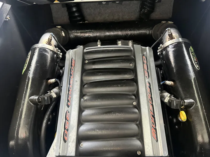 Slide: The Image of 2012 Malibu Wakesetter 23 LSV Monsoon 350 engine view. - 18