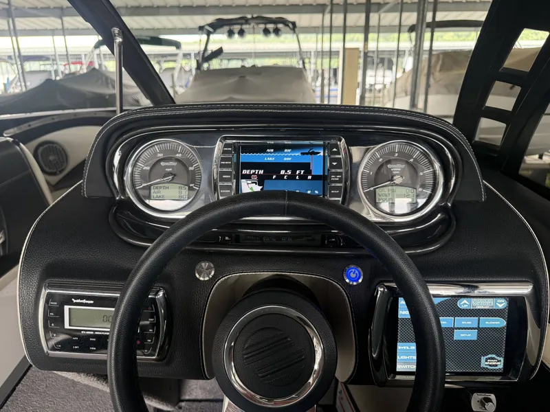 Slide: The Image of Dashboard of a 2012 Malibu Wakesetter 23 LSV boat. - 19