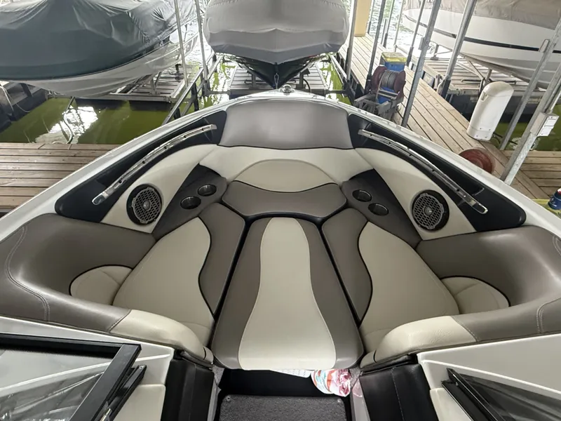 Slide: The Image of Interior of 2012 Malibu Wakesetter 23 LSV with luxurious seating. - 25