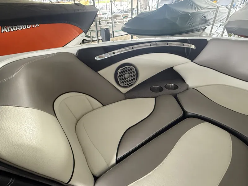 Slide: The Image of Interior of 2012 Malibu Wakesetter 23 LSV with speaker and cup holders. - 26