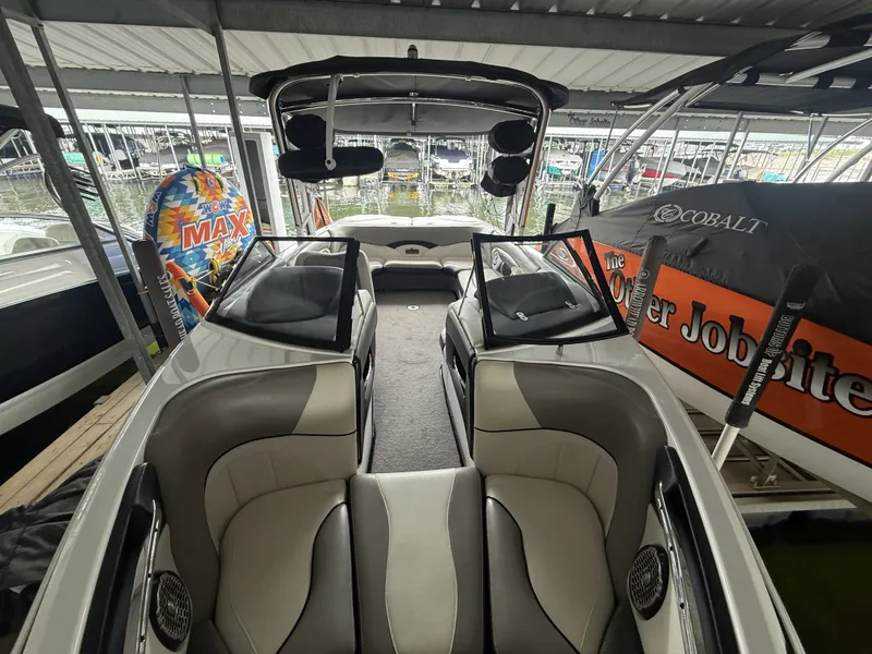 Slide: The Image of Interior view of a 2012 Malibu Wakesetter 23 LSV boat in dock. - 28