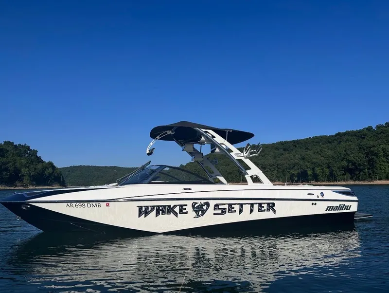 Slide: The Image of 2012 Malibu Wakesetter 23 LSV on a calm lake. - 32