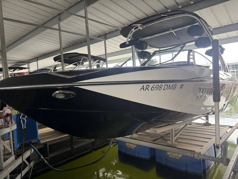 Slide: The Image of 2012 Malibu Wakesetter 23 LSV boat in dock. - 5