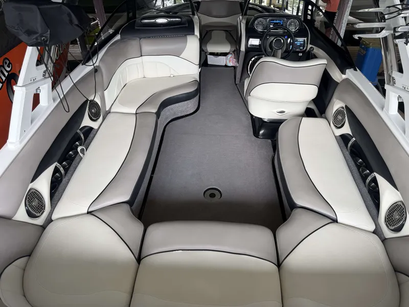 Slide: The Image of Interior of 2012 Malibu Wakesetter 23 LSV with luxurious seating. - 9