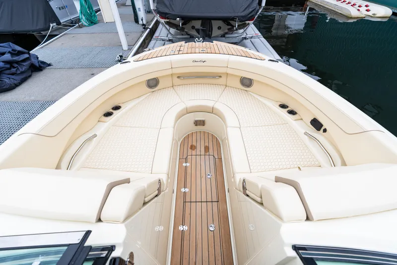 Slide: The Image of Luxurious interior of 2025 Chris-Craft Launch 31 GT boat with elegant seating and wood accents. - 11