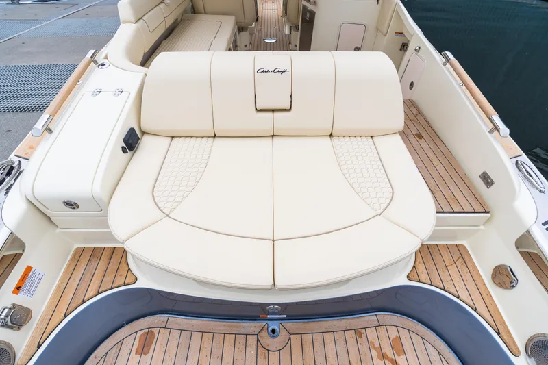 Slide: The Image of Luxurious seating on 2025 Chris-Craft Launch 31 GT boat with elegant design and teak flooring. - 15