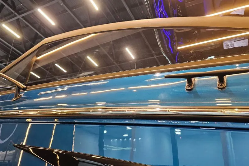 Slide: The Image of Blue Hanover 327 boat, 2027 model, with sleek design and modern detailing. - 21
