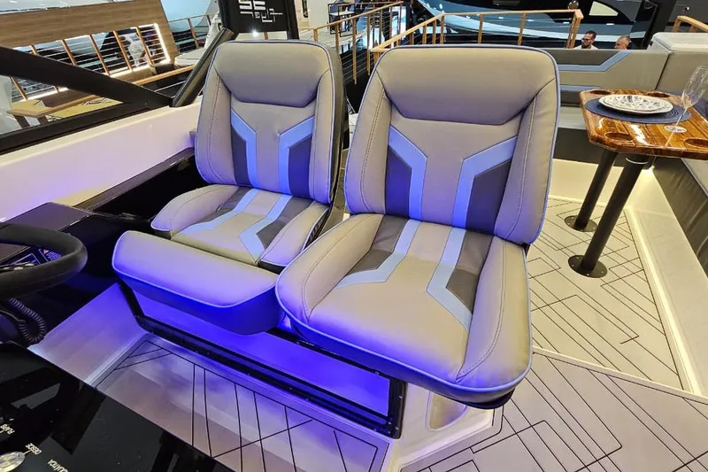 Slide: The Image of Luxurious seating on a 2027 Hanover 327 boat, featuring modern design and ambient lighting. - 30