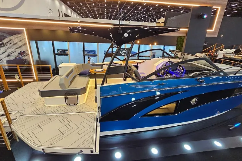 Slide: The Image of Luxurious 2027 Hanover 327 boat with sleek design and modern interior at a showroom display. - 7