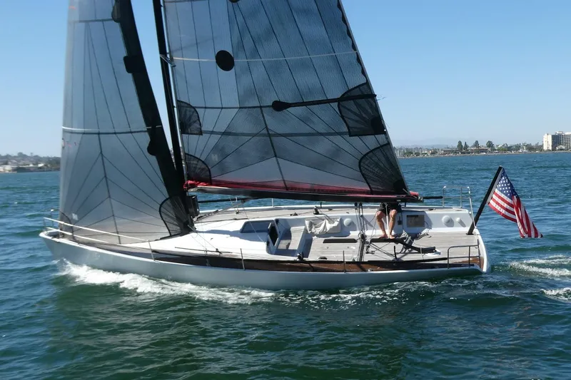 The Image of Sailing yacht Maxi Dolphin Cross Current 33, 2006 model, cruising on open water. - 0