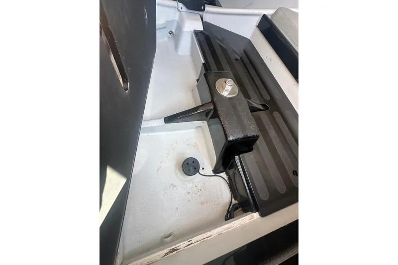 Slide: The Image of Interior view of a 2006 Maxi Dolphin Cross Current 33 sailboat, showcasing seating and hardware. - 18