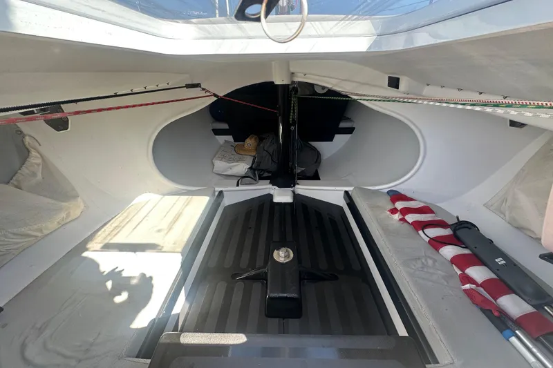 Slide: The Image of Interior of 2006 Maxi Dolphin Cross Current 33 sailboat, featuring sleek design and storage space. - 20