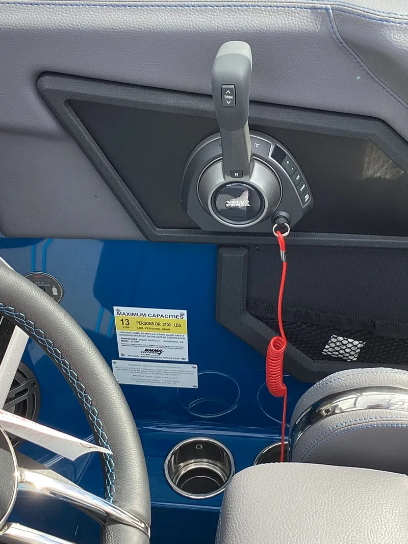 Slide: The Image of Interior view of 2026 Cobalt R4 Surf with throttle and capacity label. - 10