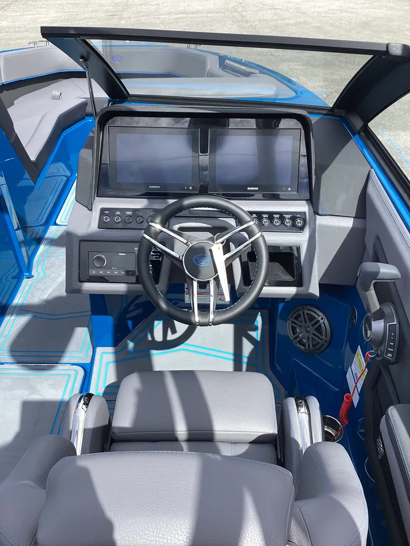 Slide: The Image of Interior of 2026 Cobalt R4 Surf with modern helm station. - 9