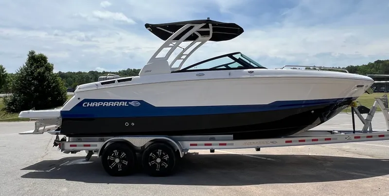 Slide: The Image of 2026 Chaparral SSX 6 boat on trailer outdoors. - 2