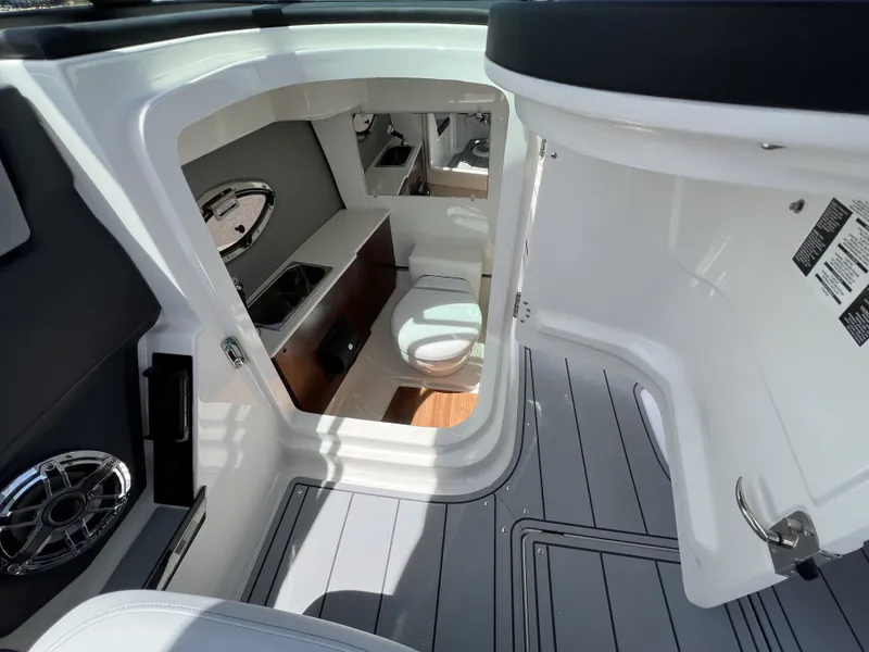 Slide: The Image of Interior of 2026 Chaparral SSX 6 with toilet and sink. - 9