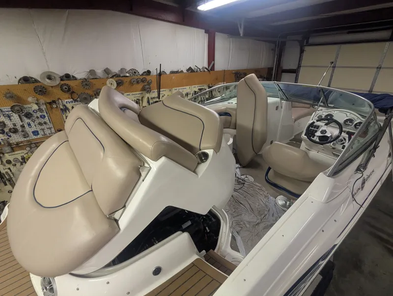 Slide: The Image of 2013 Hurricane SD2200-IO boat interior with beige seating. - 5