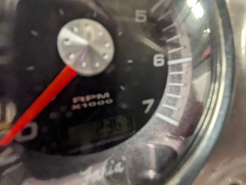 Slide: The Image of Close-up of tachometer, Hurricane SD2200-IO 2013, displaying 2300 RPM. - 7