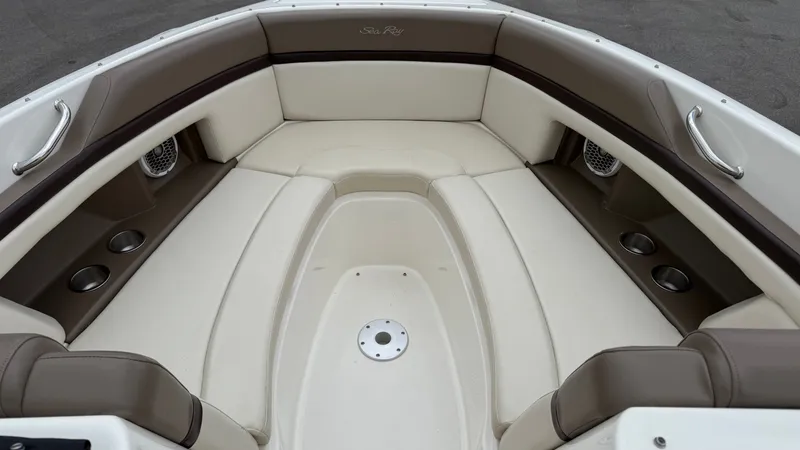 Slide: The Image of Interior of a 2013 Sea Ray 270 SLX boat with beige seating. - 20