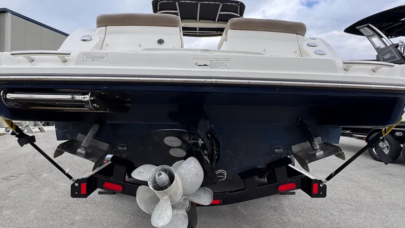 Slide: The Image of Rear view of a 2013 Sea Ray 270 SLX boat on a trailer. - 22