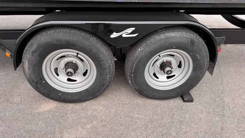 Slide: The Image of Trailer tires of a 2013 Sea Ray 270 SLX boat. - 23
