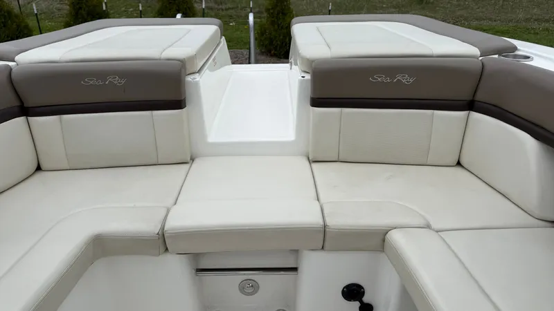 Slide: The Image of Interior of a 2013 Sea Ray 270 SLX with beige upholstery. - 8